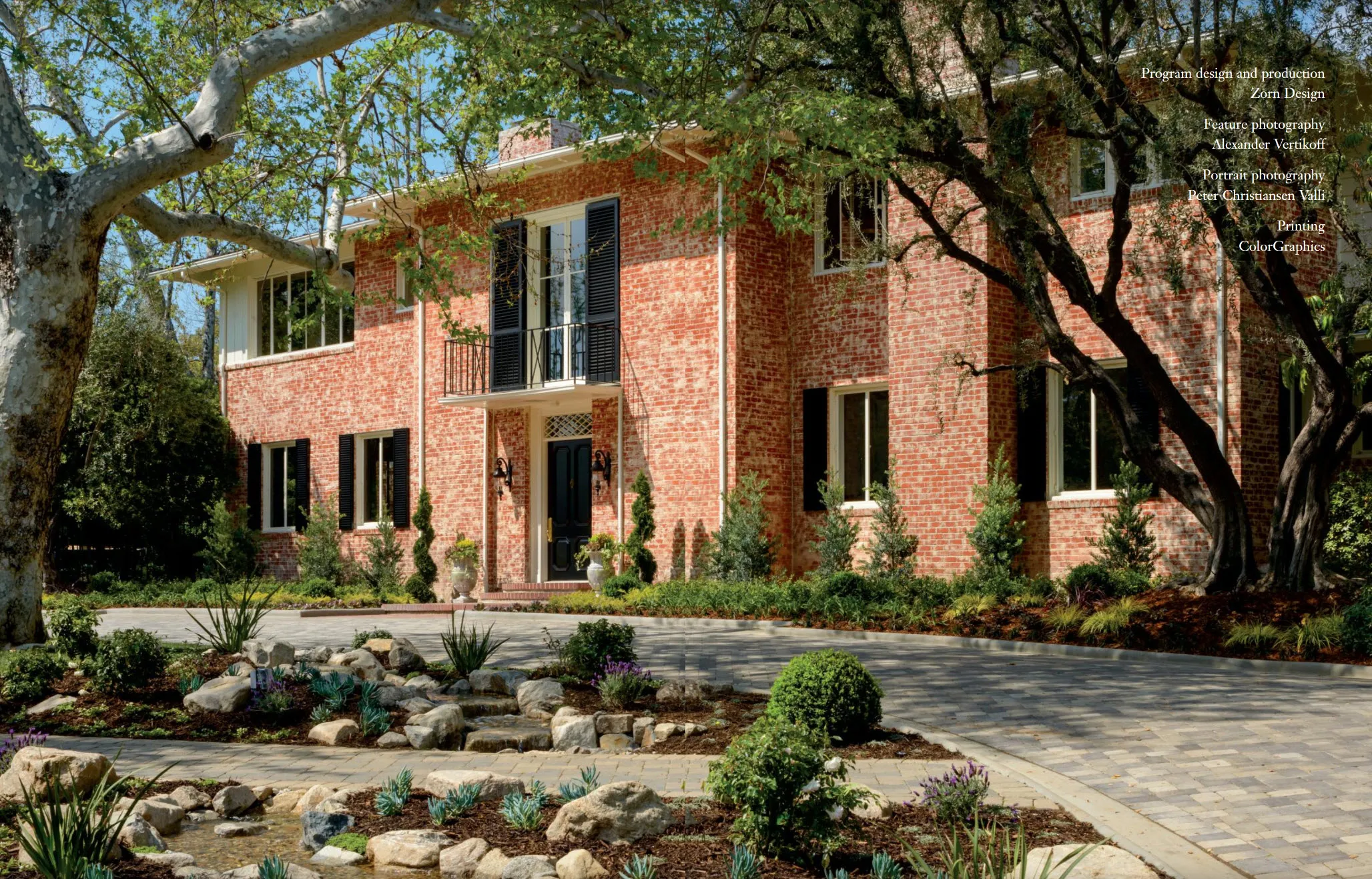 A tree in front of a house