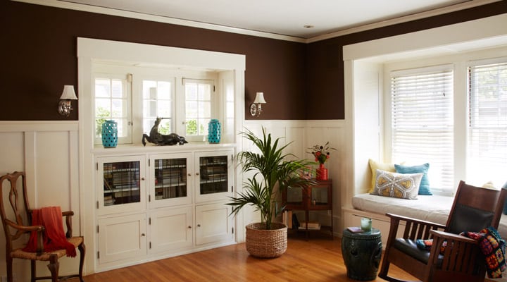 A living room filled with furniture and a fire place