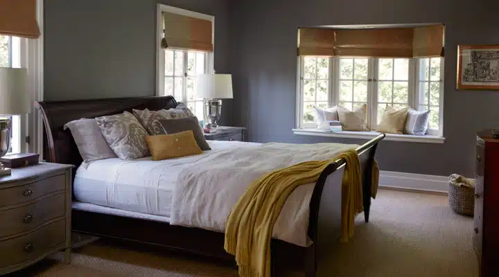 06_marengo_0151 A bedroom with a bed and desk in a hotel room