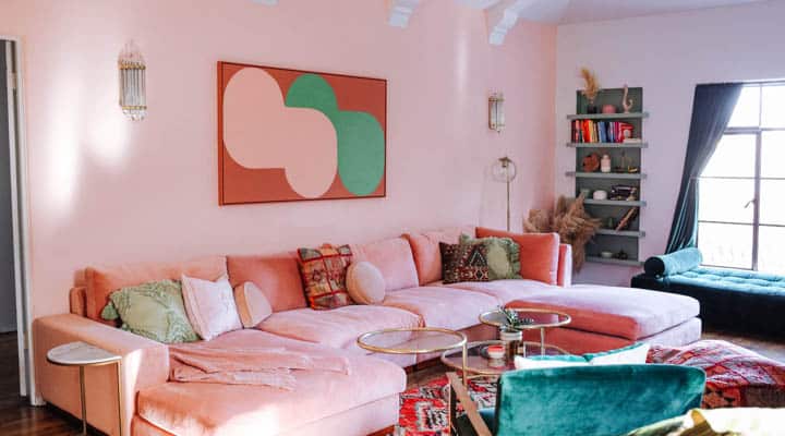 A living room filled with furniture and a fire place