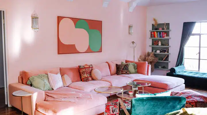 0P9A8388-720x400 A living room filled with furniture and a fire place