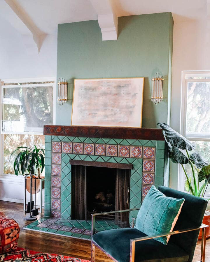 A living room filled with furniture and a fire place