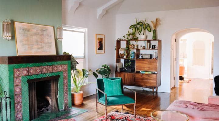 A living room filled with furniture and a fire place