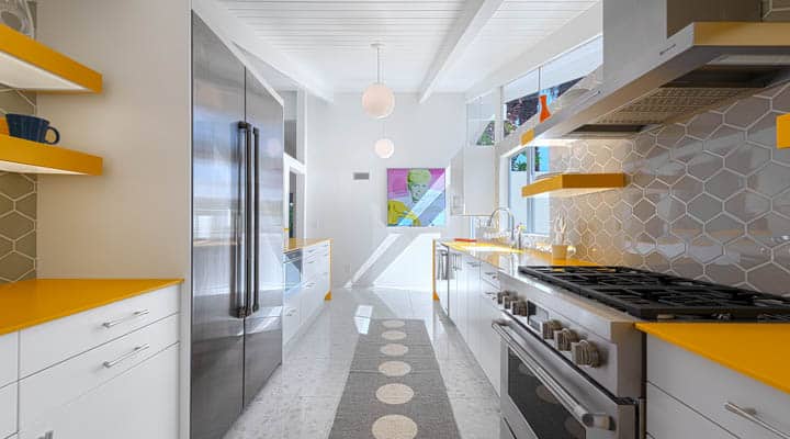 A large kitchen with stainless steel appliances