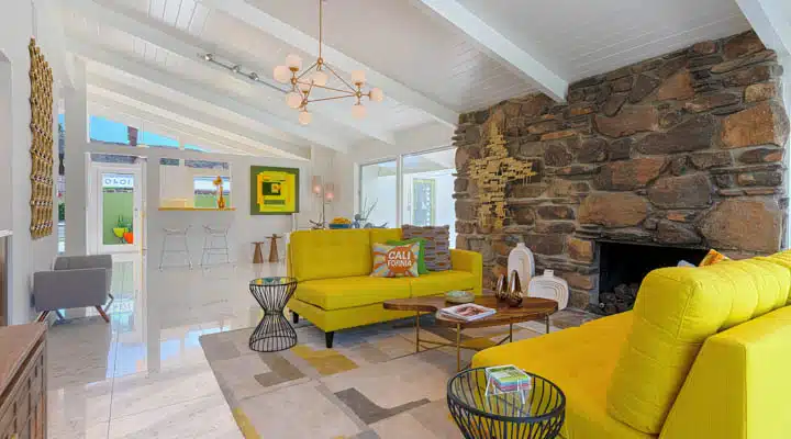 12-720x400 A living room filled with furniture and a fireplace