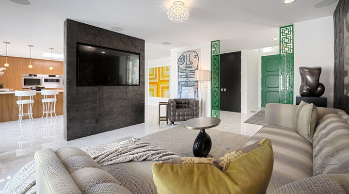 A living room filled with furniture and a flat screen tv