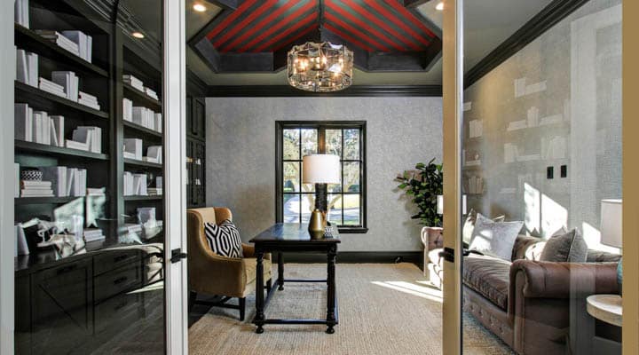 A living room filled with furniture and a large window