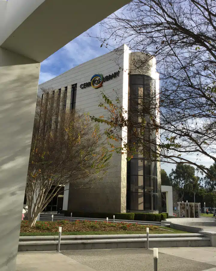 2016-01-13-09.45.07 A tower that has a sign on the side of a road