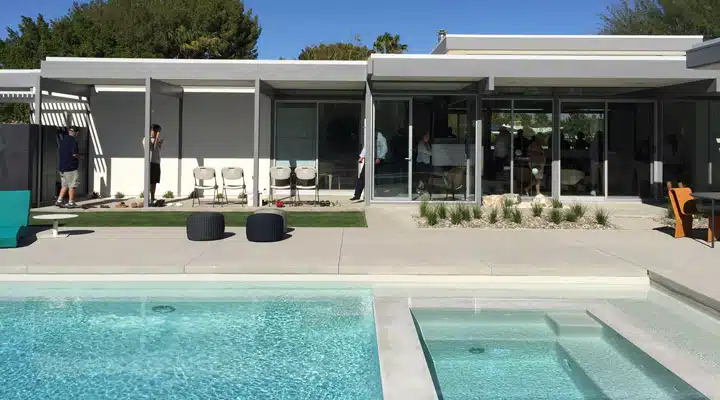 2016-02-19-14.05.21 A person standing in front of a building