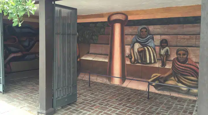 2016-07-12-11.12.32 A chair sitting in front of a brick building