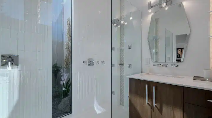 30-720x400 A room with a sink and a mirror