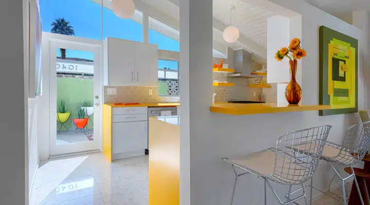 31-720x400 A dining room table in front of a window