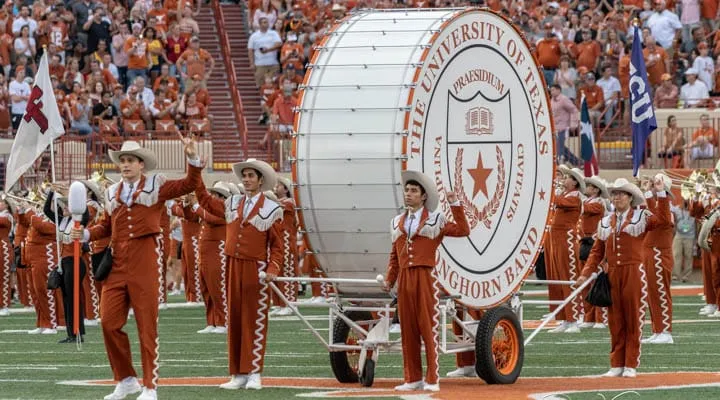 Big Bertha A group of people performing on stage in front of a crowd
