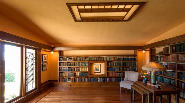 A living room filled with furniture and a large window