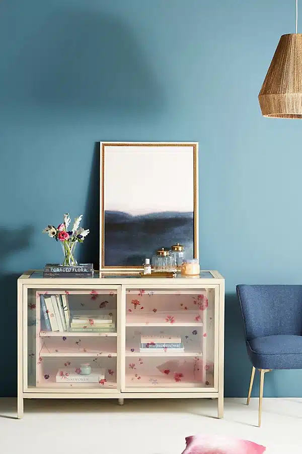 44786192_066_b A bedroom with a bed and desk in a small room