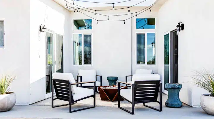 5J1A0975-720x400 A living room filled with furniture and a large window