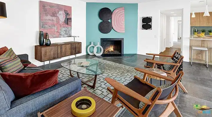 5aa0c16a71a60943c852be58-720x400 A living room with a couch and a chair