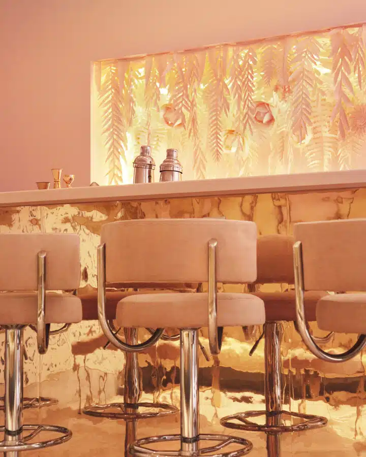 9 A chair sitting in front of a mirror