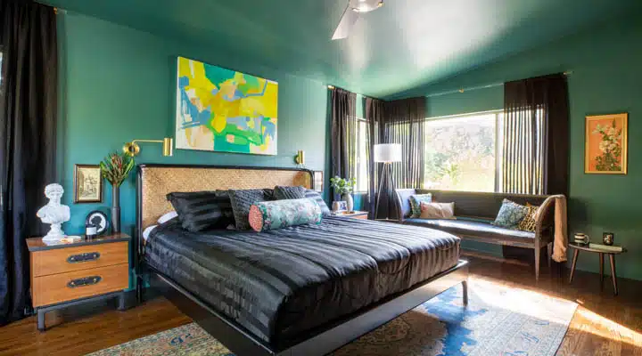 AV-246-HDR-720x400 A bedroom with a bed in a room