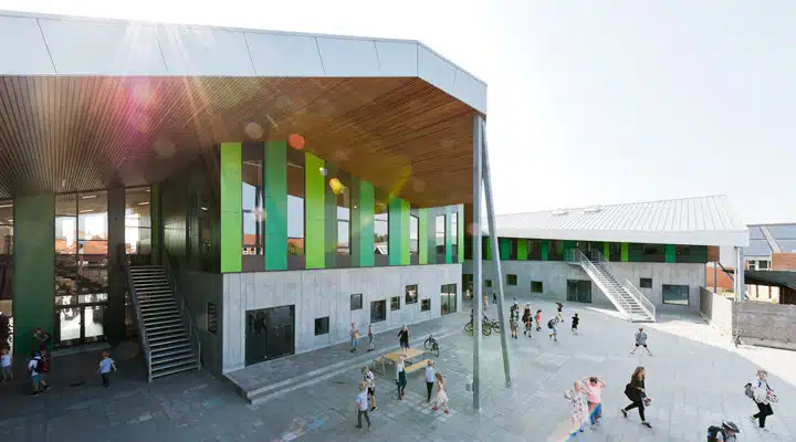 Aabybro_039Photo_CEBRA_Mikkel_Frost A group of people standing in front of a building