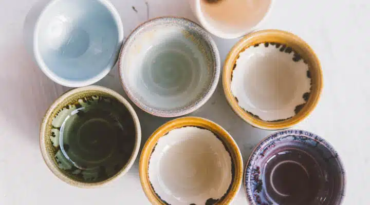 3394380 ceramic bowls for drinks close-up. Ceramic ware made by A cup of coffee on a table