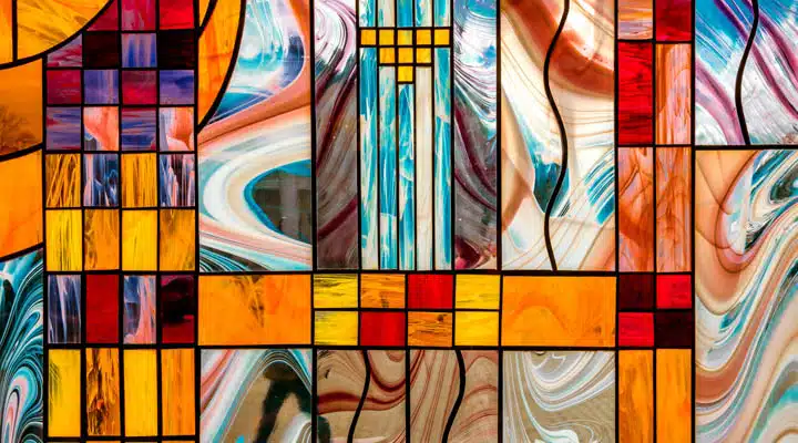 image of a multicolored stained glass window with an irregular b A colorful kite