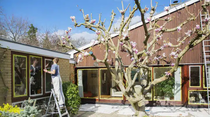 AdobeStock_315249685-720x400 A person standing in front of a building