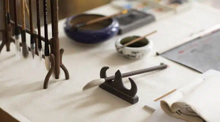 Ink brush and Chinese calligraphy A wooden table