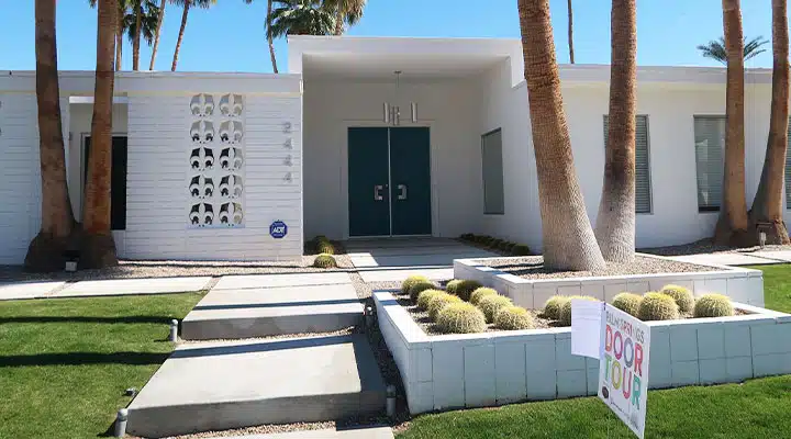 Alhambra-Blue-MWDT02_720x400 A group of people sitting at a table in a park