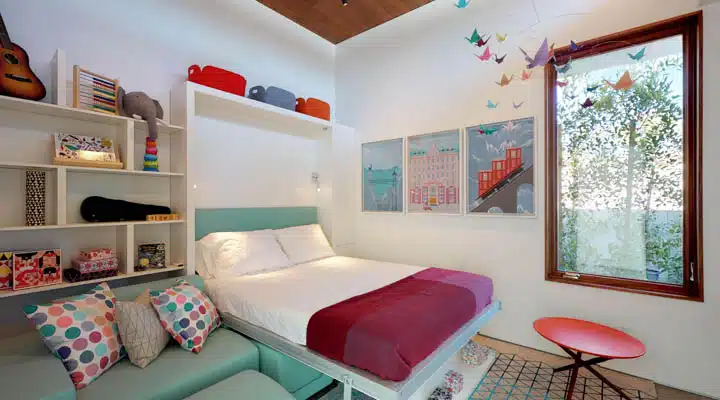 Axiom-Desert-House-03252019_113718_-_crop-720px A bedroom with a bed and desk in a room