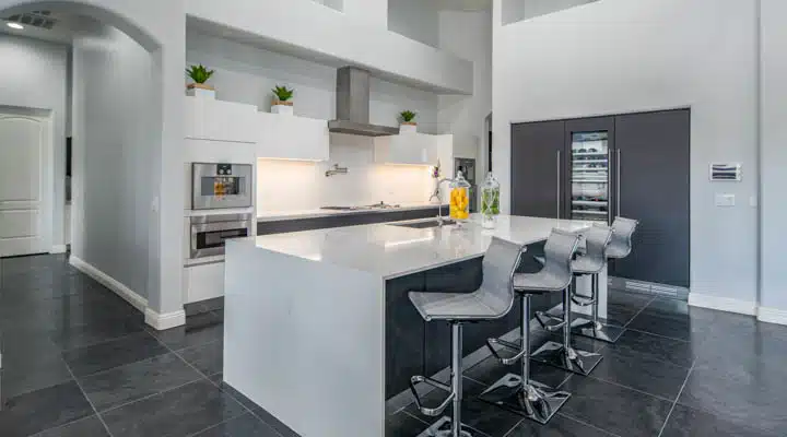 BH-CraigRoot-Kit2-918-720x900 A kitchen with a refrigerator and table in a room