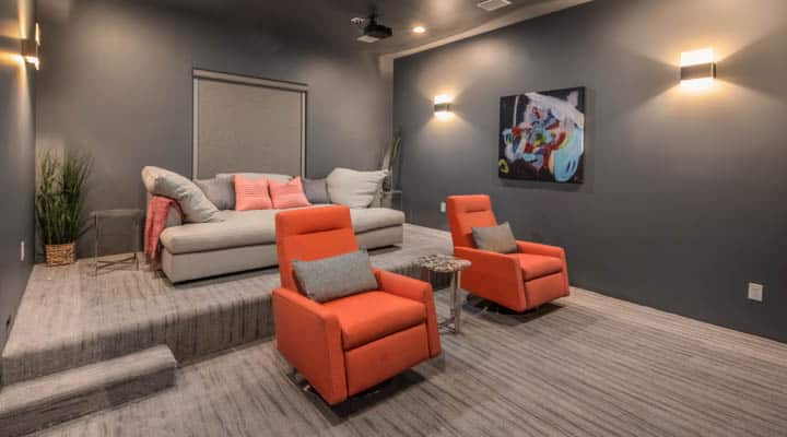 A living room filled with furniture and a flat screen tv