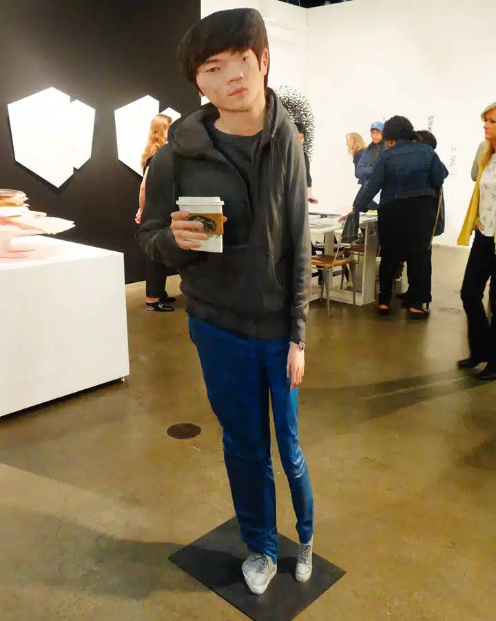 Bus-Stop-1 A person standing in a room