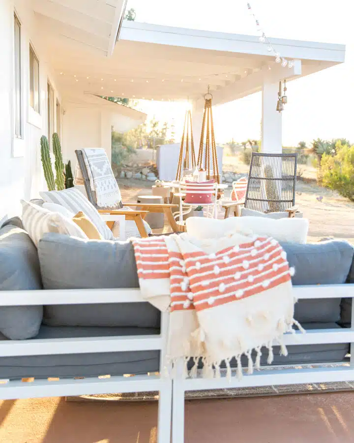 CJTD-158 A chair sitting in front of a building