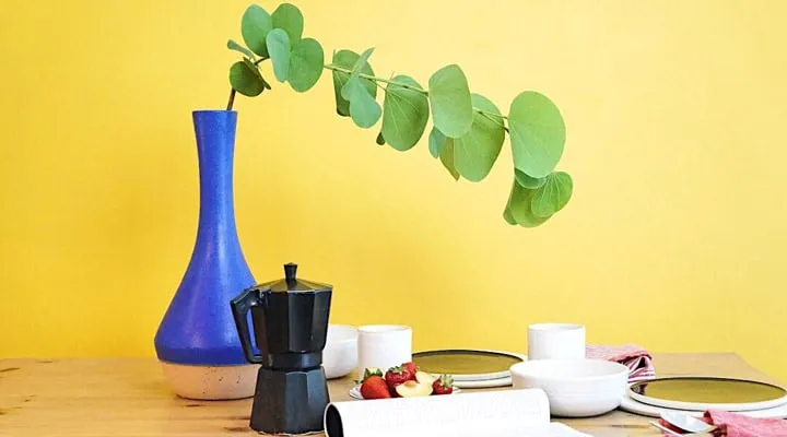 COTM_Honey-Glow-Kitchen-720x400 A vase of flowers on a table