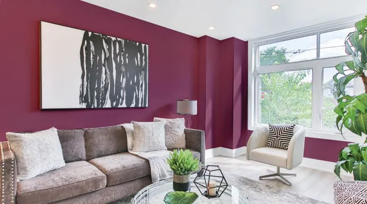 COTM Jul-Dec A living room filled with furniture and vase of flowers on a table