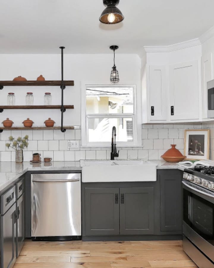 A kitchen with stainless steel appliances and wooden cabinets
