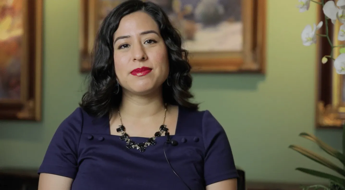 Christine_Jahan_PSHA__Feature_Image A person posing for the camera