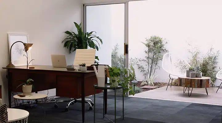 Clock-2-720x400 A living room filled with furniture and a large window