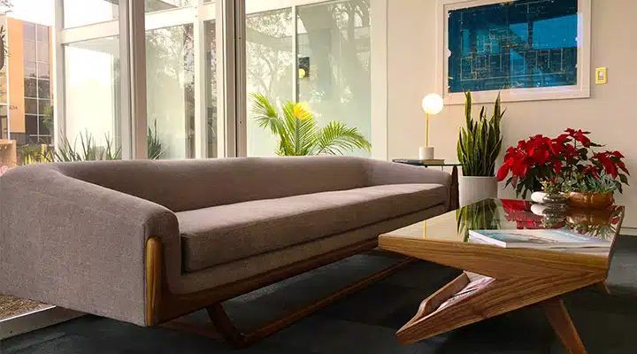 Clock-6-720x400 A living room filled with furniture and a large window