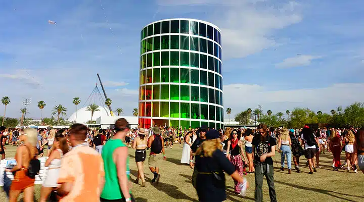 Coachella-2_720x400 A group of people standing in front of a crowd