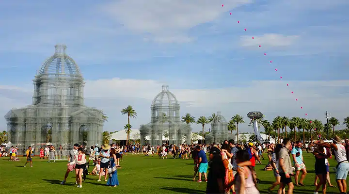 Coachella-5_720x400 A group of people flying kites in a field