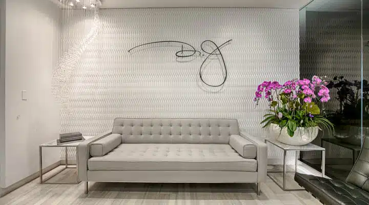 Copy_of_MARK2636_HDR-720x400 A living room filled with furniture and vase of flowers on a table