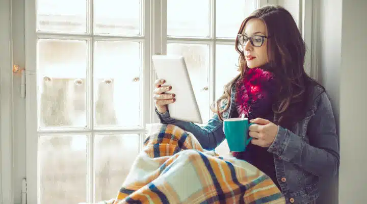 D A woman standing in front of a window