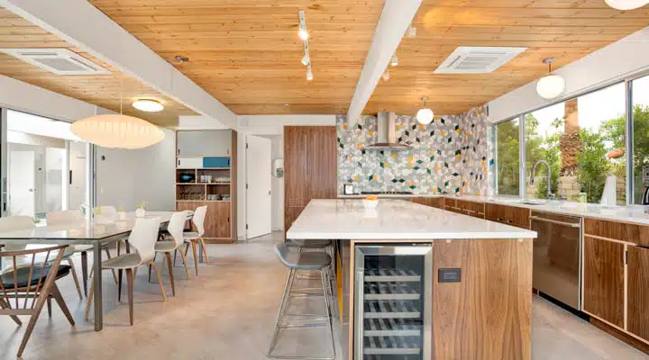 DSC00534-720x400 A kitchen with a dining room table