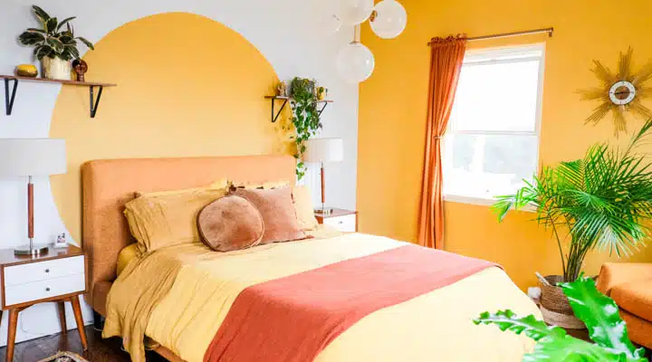 DSCF5773-720x400 A bedroom with a bed and desk in a room