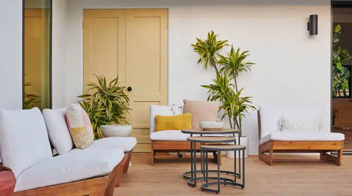 DSC_2087-720x400 A living room filled with furniture and a large window