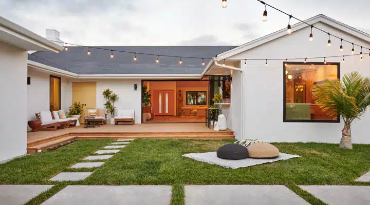 DSC_2131-720x400 A house that has a sign on the side of a building