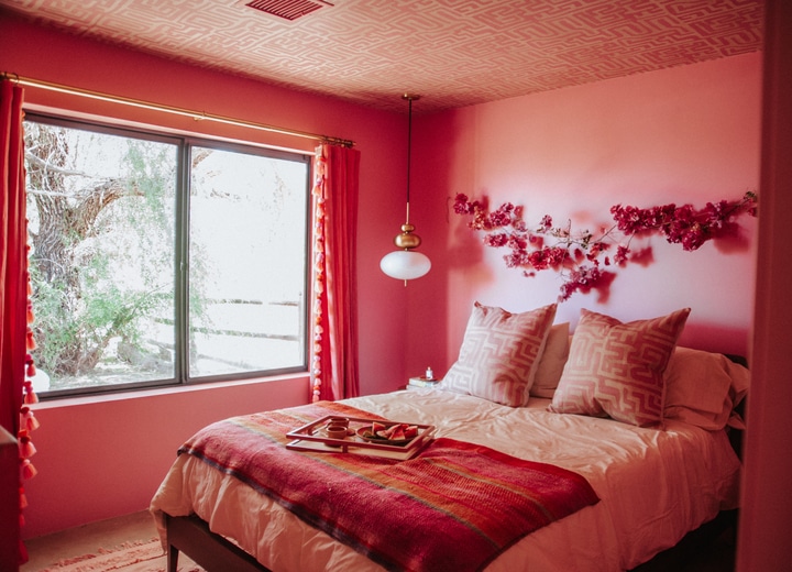A bedroom with a large bed sitting in a room