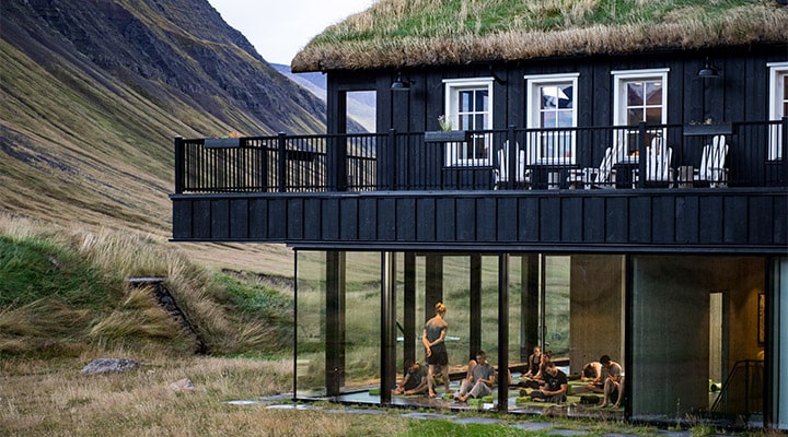 A building with a mountain in the background